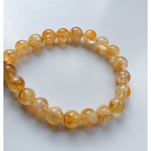   **Citrin - A Boldogság, Bőség és Energiák Napfényes Kristálya**