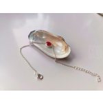 Élégance Rouge Impérial – szolid ovális drágaköves karkötő középen rubinnal